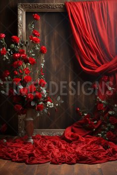 red roses are in a vase on the floor next to an old frame with curtains