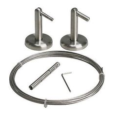 a set of stainless steel kitchen faucets and accessories