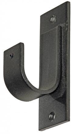 an iron hook on the side of a black metal wall mounted door handle with two screws