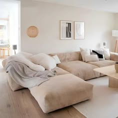 a living room filled with lots of furniture