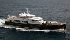 a large black and white boat in the ocean