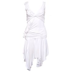 Presenting The Versace White Asymmetric Two-Piece Set, Size 40/42. This Stunning Ensemble Includes A Tank Top With A Single Ruffled Sleeve, A Tie Accent, And A Side Zip Closure, Paired With A Knee-Length Asymmetric Skirt Featuring A Scrunched Hip Accent. Item Defects Include A Split Seam And A Hole On The Skirt Near The Hip Band, As Well As Snags Throughout. Recommended For A U.S. Size Xs/S, The Material Offers A Comfortable Stretch. Measurements Are Provided As A Courtesy; Please Do Not Rely So Dresses Versace, Versace Dresses, Big Dresses, Asymmetric Skirt, Versace Dress, Atelier Versace, New Years Dress, White Dresses For Women, Asymmetrical Skirt