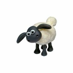 a black and white toy sheep with big eyes