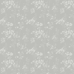 a gray and white floral wallpaper with small flowers on the top, in front of a grey background