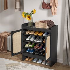 a black shoe rack with shoes on it