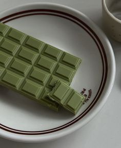 a chocolate bar sitting on top of a white plate