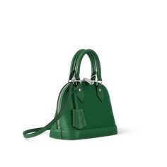 LOUIS VUITTON® - Alma Bb - Borneo Green Alma Louis Vuitton, Heritage Colours, Alma Bb, Ballerina Pumps, Louis Vuitton Official, Buckle Shoes, Monogram Bag, Silver Jewelry Fashion, Fashion Jewelry Necklaces