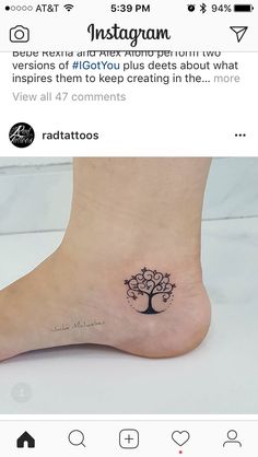 a small tree tattoo on the bottom of a person's foot, which reads instagram