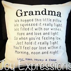 a white pillow with the words grandma on it and an image of a poem written in cursive writing