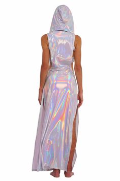 Step into the spotlight and unleash your inner goddess with the Atlantis holographic white maxi dress. Made with lightweight, prismatic spandex that gently hugs your curves and drapes beautifully, this dress shimmers and shines as you move, capturing everyone's attention. Whether you're dancing under the stars or soaking up the sun, this festival maxi dress is guaranteed to elevate your ethereal vibes. FEATURES: Maxi Length High side slits for ease of movement Cowl neck with voluminous hoodie Sl Future Disco, Iridescent Clothing, Diamond Suit, Holographic Dress, Festival Dresses, Rave Dress, Grecian Dress, Resort Wear Dresses, Rave Party