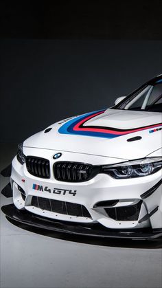 a white car with red, blue and black stripes on it