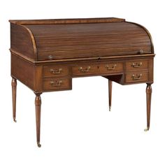 an antique wooden desk with two drawers