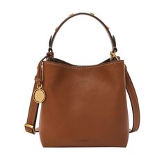 PRICES MAY VARY. Editor's Notes: This Jessie Bucket Bag is our take on the iconic silhouette with genuine leather that gets softer over time and features Fossil design elements like our Signature Knurling and engravable Legacy Charm. Wear as a top handle or a crossbody. Perfectly Proportioned: 7.25" L x 5" W x 7" H; 1 Adjustable & Detachable Crossbody Strap, 1 Shoulder Strap Premium Craftsmanship: Genuine Leather Small Bucket Shoulder Bag; Zipper Closure; Faux Leather Lining; imported It's all i Fossil Bags Women, Leather Drawstring Bags, Small Buckets, Brown Crossbody Bag, Brown Crossbody, Brown Leather Bag, Purse Accessories, Small Crossbody Bag, 7 H