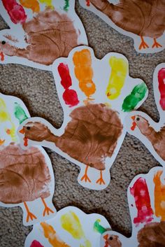 handprint turkeys are shown on the floor