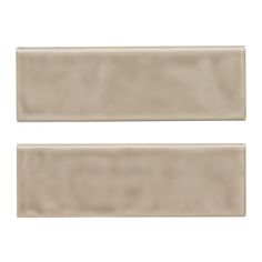 an image of two beige tiles on a white background