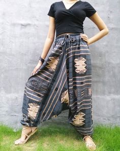 "The harem style trousers made from cotton fabric 100%with an elasticated smock waist and ankles they provide a comfortable lightweight fit, perfect for casual wear, festivals, yoga, holidays as well as pairing with a plain top to get that popular look. D I S C O U N T & P R O M O T I O N ❤ Buy 2 or more items, get 10% off ❤ Buy 4 or more items, get 15% off ENTER the coupon code: IYARA015 ❤ Buy 6 or more items, get 15% off ENTER the coupon code: IYARA020 PLEASE NOTE I can not apply a discoun Cotton Hippie Harem Pants For Yoga, Black Ankle-length Cotton Harem Pants, Festival Wide Leg Harem Pants With Elastic Waistband, Baggy Cotton Harem Pants Ankle-length, Baggy Cotton Ankle-length Harem Pants, Festival Cotton Ankle-length Harem Pants, Cotton Ankle-length Harem Pants For Festivals, Cotton Wide Leg Harem Pants For Festival, Relaxed Fit Harem Trousers For Festivals