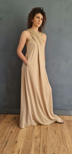 Beige Maxi Dress, Draped Maxi Dress, Long Maxi Dress ✥ SHIPPING Standard Shipping up to 14 business days depending on your location Express shipping Upgrade Avaiable : 2-3 biz days via DHL Worldwide ✥ SIZING The model in the picture wears size M. Height: 5'9" and weigh 60 kg. Available sizes: XS - 3XL Please, refer to my Size Chart below to find your perfect size match!  Keep in mind that each height can be adjusted to yours!   I'll be happy to make the item per your body measurements - just lea Beige A-line Sundress Maxi Dress, Summer Draped Beige Dresses, Beige Draped Summer Dress, Beige Long Sundress, Beige A-line Maxi Sundress, Beige Stretch V-neck Maxi Dress, Beige Stretch Maxi Dress With V-neck, Best Cardigans, Criss Cross Dress