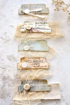 an assortment of buttons and tags attached to burlocks