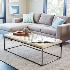 a living room with a couch and coffee table