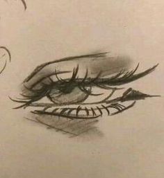 a drawing of a woman's eye with long lashes