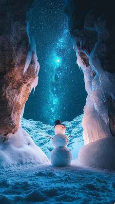 a snowman is standing in the middle of an ice cave looking up at the night sky