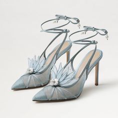 Step into elegance with these light blue mesh stitching floral decor pearl lace-up wedding heels. Featuring intricate detailing, they blend sophistication with a touch of whimsical charm for your special day. Color: Light blue Material: Mesh/Satin Heel Type: Stiletto heel Heel Height: 4.09'' / 104 mm approx Product measurements were taken using size 8. Please note that measurements may vary by size. Toe: Pointy toe Stitching floral decor design Pearl lace-up deign Toe cap design Handcrafted US sizing. Fits true to size. Light Blue Wedding Shoes, Light Blue Wedding Dress, Light Blue Heels, Whimsical Shoes, Blue Wedding Shoes, Floral Heels, Blue Accessories, Bridal Heels, Pearl And Lace