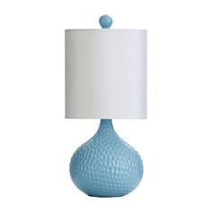 a light blue table lamp with a white shade on the base and a round shape