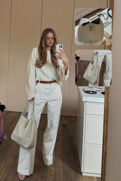 Saint Laurent Le 5 à 7 supple large in smooth leather in blanc vintage colour. White monochrome outfit inspiration. Model off duty outfit aesthetic.  Photo credits: @rosiehw on Instagram Le 5 A 7 Ysl Outfit, Rive Gauche Ysl Bag, White Monochrome Outfit, Ysl Outfit, Ysl Card Holder, Bags Ysl, Model Off Duty Outfits, Saint Laurent Vintage, Saint Laurent Bags