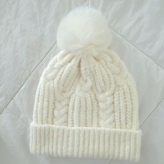 Knitted, Cream White, Pom Beanie. Never Worn, In Mint Condition. Cozy White Knit Hat, Cozy White Hat, White Acrylic Hat For Fall, Casual White Acrylic Hat, White Knitted Hat For Fall, White Knit Winter Hat, Winter White Knit Hat, White Knit Beanie Hat, White Knitted Hat For Winter