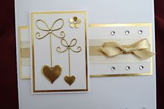 two cards with bows and hearts on them