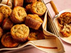 some muffins are sitting in a pan on a table