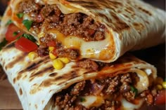 two burritos stacked on top of each other