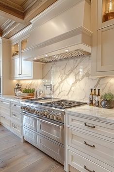 29 Apartment Kitchen Decor with DIY Wall Art Ideas Luxury Kitchen Designs, Kitchen Paint Color, Coastal Kitchen Decor, Kitchen Vent, Painted Kitchen Cabinets Colors, Refacing Kitchen Cabinets, Color Kitchen, Kitchen Remodeling Ideas, Kitchen Range Hood