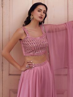 Elevate your ethnic ensemble with this stunning pink color georgette lehenga set, curated to make you stand out at any event or occasion. Crafted with finesse and elegance, this ensemble exudes charm and sophistication. The lehenga features a fluid silhouette in soft georgette fabric, offering comfort and style in equal measure. Its plain design adds a touch of minimalistic chic, making it versatile for various styling options.
Complementing the lehenga is a matching choli adorned with exquisite Wedding Salwar Kameez, Kids Wear Girls, Lehenga Crop Top, Choli Dress, Lehenga Choli Wedding, Party Wear Kurtis, Floral Lehenga, Party Wear Lehenga Choli, Bollywood Lehenga