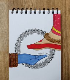 a spiral notebook with a drawing of two hands holding each other's shoes and the words catch written on it