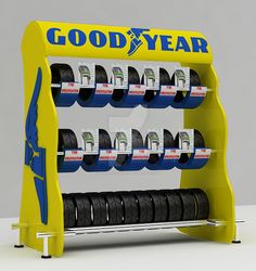 a tire store display with tires on the front and back sides, for goodyear