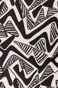 an abstract black and white pattern on fabric