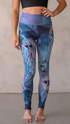 Model wearing WERKSHOP Jellyfish Athleisure Leggings. The artwork on the leggings shows white jellyfish swimming up the wearer's legs over a cobalt blue and purple watercolor background. Pilates Fashion, Jellyfish Swimming, Fun Leggings, Gym Tights, Athleisure Leggings, Eagle Rock, Reversible Top, Female Founders, Legging Fits