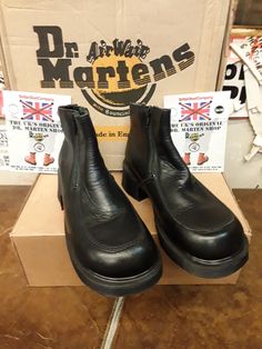 These are a model of Dr MARTENS that were made in the heyday of the 1990s. They were made at their original factory in Northampton,  England.   These boots were only made for a couple of seasons, so were rare even back then.  The boot is finished in black leather and has two zips for ease of use. They are ankle length and have a black so,e unit with a heel. These are a uk size 4 European 37 ladies USA 6 Northampton England, Dr Martens Shoes, Hunter Boots, Beautiful Shoes, Dr. Martens, Boot Shoes Women, New Shoes, Rubber Rain Boots, Ankle Length