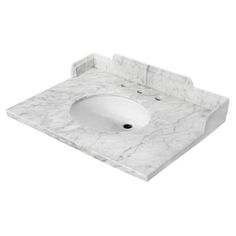 a bathroom sink with a white marble counter top and black faucet on the side