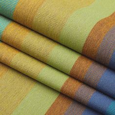 multicolored striped fabric is shown in close up view with no background or pattern