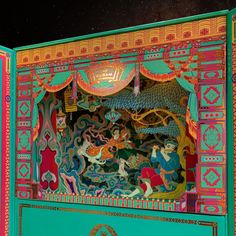 an elaborately decorated stage with people and animals in the center, on display against a black background