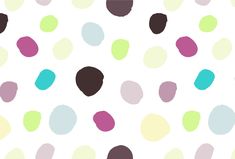 a white background with multicolored polka dots