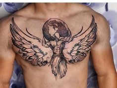 a man with a tattoo on his chest has an angel and cross in the middle