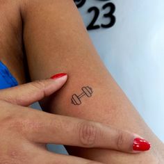 Mini Barbell Tattoo, Dumbbell Tattoo Design For Women, Tattoo Fitness Women, Gym Rat Tattoo Ideas, Small Gym Tattoos, Gym Tatoos Ideas, Weightlifting Tattoos For Women, Dumbbell Tattoo Design