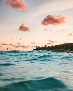 the ocean is very choppy and blue in color