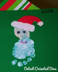 an elephant with a santa hat on it's head is sitting next to a christmas card