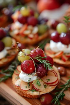 an assortment of appetizers with fruit on them