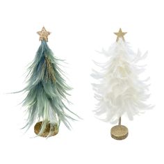 two different types of christmas trees with gold stars on top and white feathers on the bottom