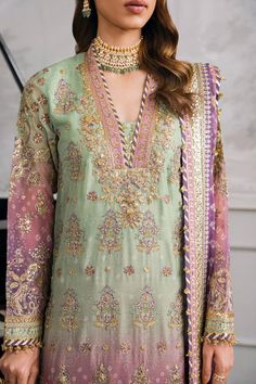 Original Designer 3-piece suit in chiffon silk boasts a vibrant combination of lilac and mint green hues, expertly handcrafted on a digital printed chiffon fabric. Complete with an embroidered dupatta and dyed silk trouser, it exudes luxury and elegance. Custom stitching is available with this product. Upon placing your order, you will receive an email requesting your custom measurements. CUSTOM ORDER DELIVERY TIME: 6-8 WEEKS Pure chiffon silk Dyed silk trouser Embroidered digital printed silk d Front Neck Designs For Suits, Silk Suit Designs Indian, Lucknowi Kurta, Patiala Salwar Suits, Phulkari Dupatta, Bridal Dupatta, Kurta Dress, Plus Size Suits, Pure Chiffon